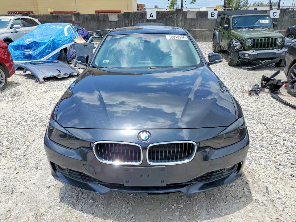 2013 BMW 3 series VIN WBA3B5C59DJ599182 COPART salvage auction — MINOR DENT/SCRATCHES, FL - CERT OF TITLE-FLOOD DAMAGED, sold $750 on 2026-07-02 (photo 5)