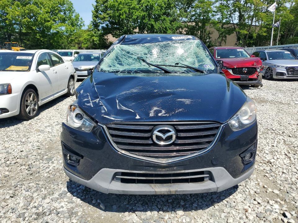 2016 Mazda VIN JM3KE4DY1G0767228 COPART salvage auction — ROLLOVER, Ma - Cert Of Title-Reconstrctd Coll, sold $2,350 on 2026-07-16 (photo 5)