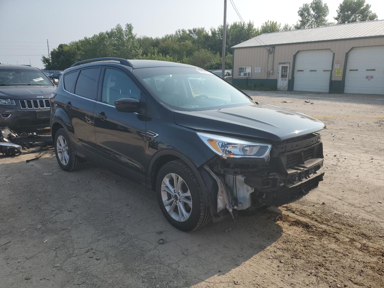 2018 FORD ESCAPE VIN 1FMCU0GD9JUA18626 COPART salvage auction — ALL OVER, IL - SALVAGE CERTIFICATE, sold $2,000 on 2024-10-07 (photo 4)