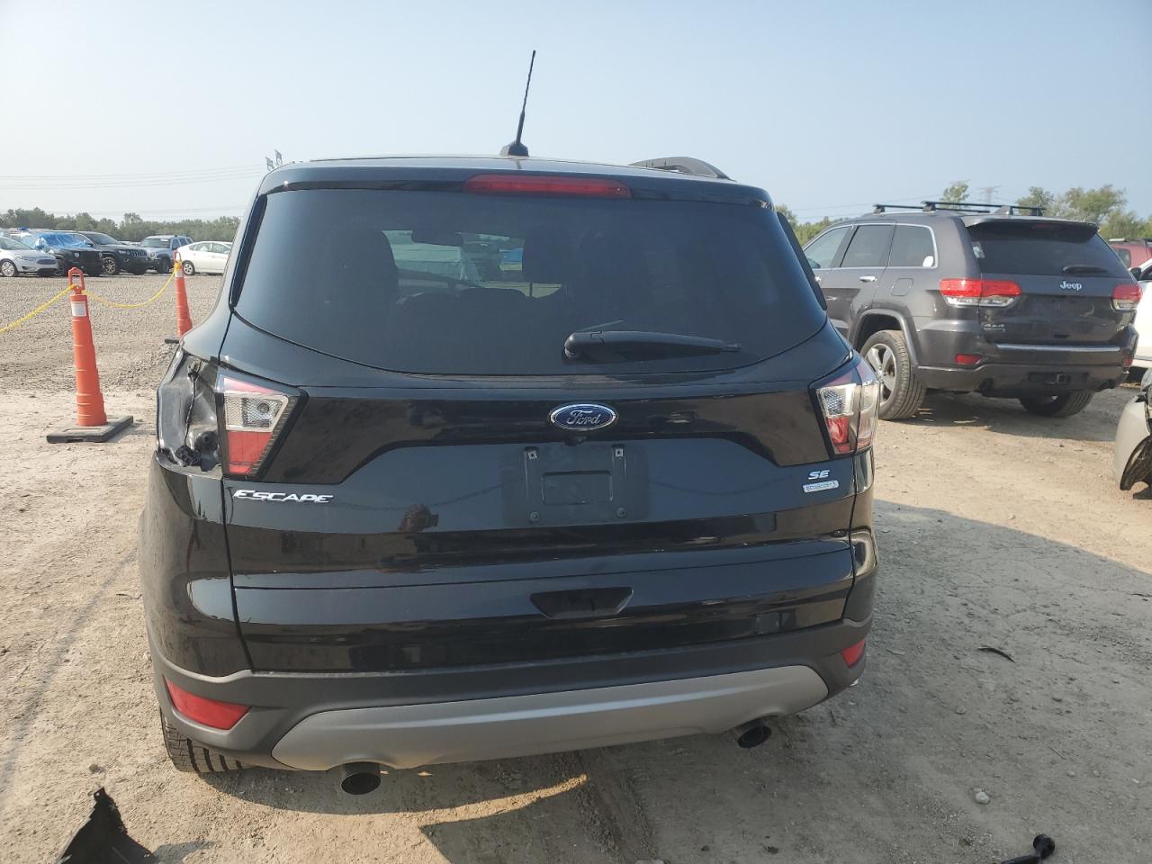 2018 FORD ESCAPE VIN 1FMCU0GD9JUA18626 COPART salvage auction — ALL OVER, IL - SALVAGE CERTIFICATE, sold $2,000 on 2024-10-07 (photo 6)