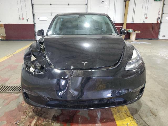 2022 Tesla Model y VIN 7SAYGDEE5NF384993 COPART salvage auction — FRONT END, Fl - Cert Of Title Slvg Rebuildable, sold $10,700 on 2026-07-02 (photo 5)