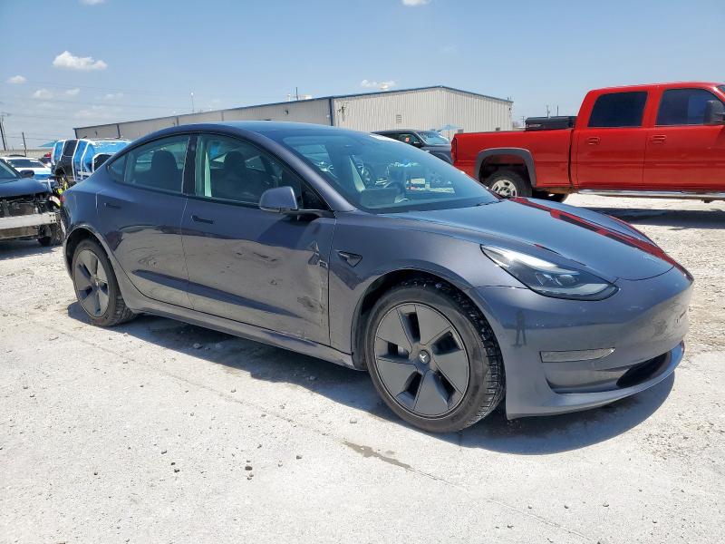 2021 Tesla Model 3 VIN 5YJ3E1EA7MF029847 COPART salvage auction — SIDE, Tx - Certificate Of Title, sold $3,900 on 2026-07-28 (photo 4)