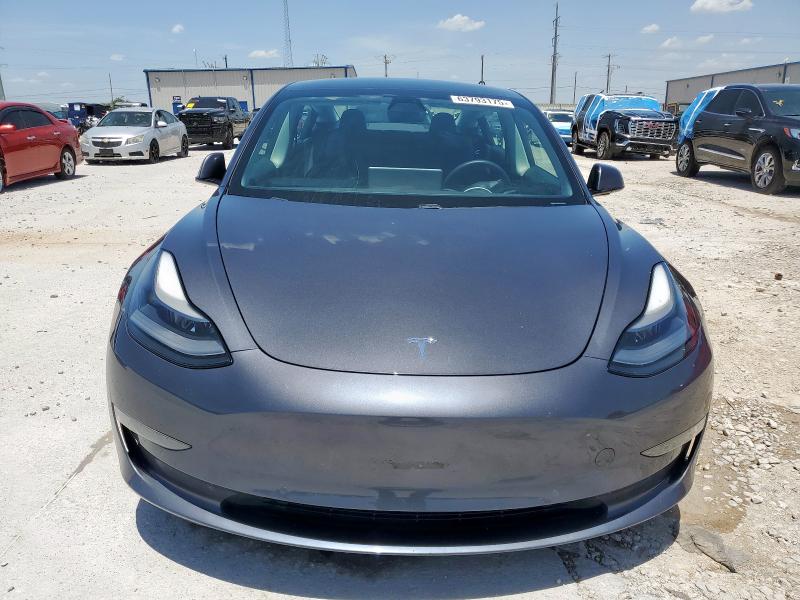 2021 Tesla Model 3 VIN 5YJ3E1EA7MF029847 COPART salvage auction — SIDE, Tx - Certificate Of Title, sold $3,900 on 2026-07-28 (photo 5)