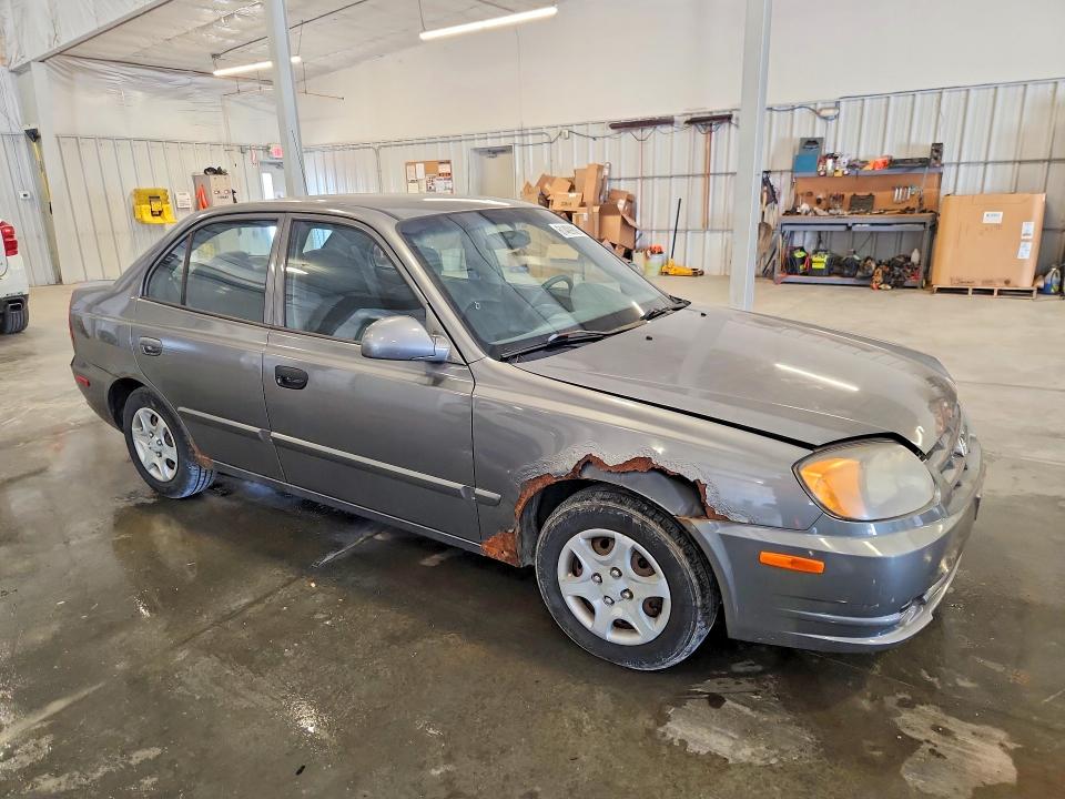 2005 Hyundai Accent VIN KMHCG45C65U600505 COPART salvage auction — HAIL, MN - CERTIFICATE OF TITLE, sold $400 on 2026-07-27 (photo 4)