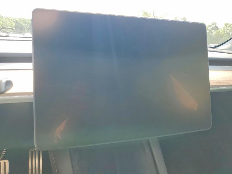 2023 Tesla Model 3 VIN 5YJ3E1EC6PF675483 COPART salvage auction — REAR END, NC - SALVAGE CERTIFICATE OF TITLE, sold $9,100 on 2026-07-31 (photo 9)