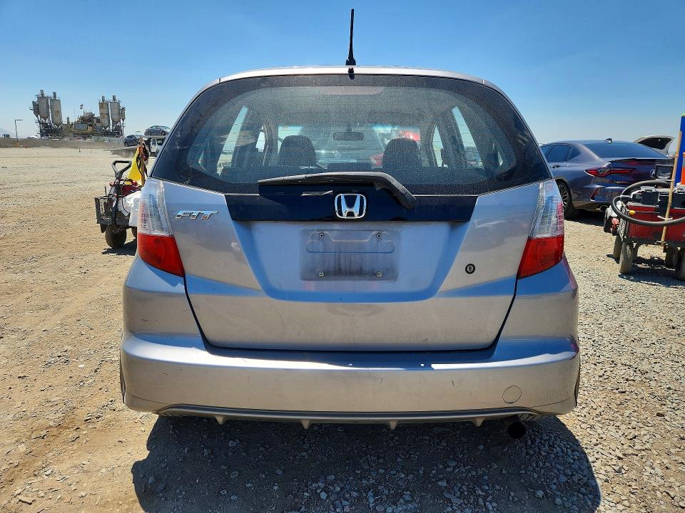 2009 Honda Fit VIN JHMGE88209C002068 COPART salvage auction — FRONT END, CA - DIS/DLR/EXP ONLY CLEAN TITLE, sold $800 on 2026-07-10 (photo 6)