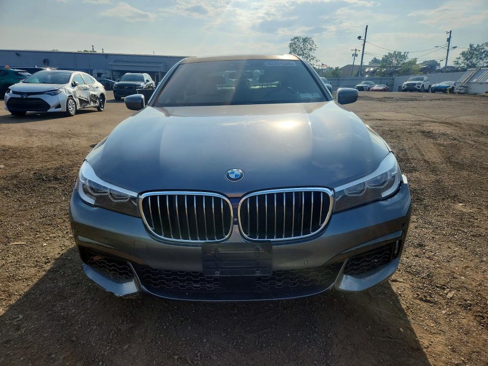 2017 BMW 7er VIN WBA7E2C58HG740107 COPART salvage auction — REAR END, Ny - Mv-907A Salvage Certificate, sold $6,200 on 2026-08-07 (photo 5)