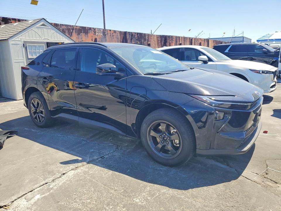 2026 Toyota Bz4x VIN JTMBFAEB6TA003068 COPART salvage auction — REAR END, Ca - Salvage Certificate, sold $11,000 on 2026-08-26 (photo 4)