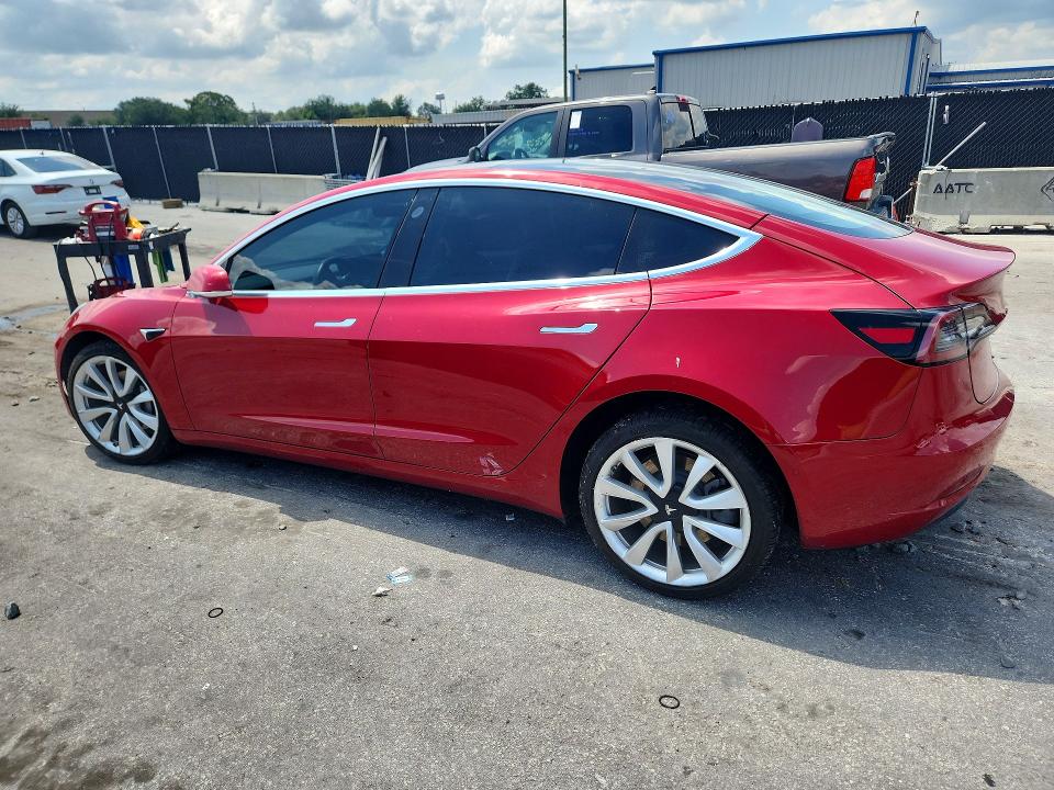 2018 Tesla Model 3 VIN 5YJ3E1EA8JF155016 COPART salvage auction — SIDE, Fl - Cert Of Title Slvg Rebuildable, sold $20 on 2026-07-30 (photo 2)