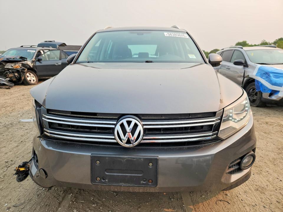 2012 Volkswagen Tiguan VIN WVGBV7AXXCW000583 COPART salvage auction — FRONT END, Ma - Cert Of Title-Reconstrctd Coll, sold $125 on 2026-07-22 (photo 5)
