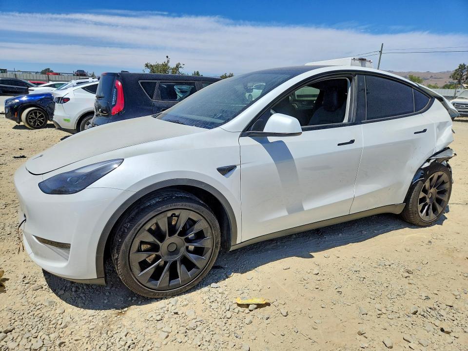 2023 Tesla Model y VIN 7SAYGDEE8PF690587 COPART salvage auction — REAR END, CA - SALVAGE CERTIFICATE, sold $2,300 on 2026-07-28 (photo 1)