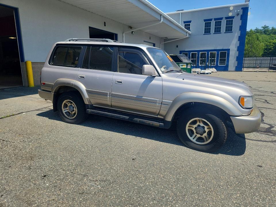 1996 Lexus Lx 450 VIN JT6HJ88J2T0149808 COPART salvage auction — MECHANICAL, Ri - Certificate Of Title, sold $2,050 on 2026-07-07 (photo 4)