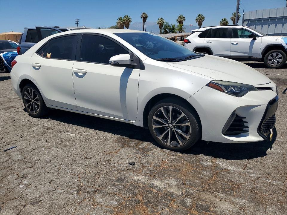 2017 Toyota Corolla VIN 5YFBURHE6HP719515 COPART salvage auction — MINOR DENT/SCRATCHES, CA - SALVAGE CERTIFICATE, sold $7,300 on 2026-07-20 (photo 4)