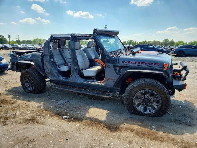 2022 Jeep Gladiator VIN 1C6JJTEG7NL167784 COPART salvage auction — ROLLOVER, VA - CERT OF TITLE - SALVAGE, sold $7,300 on 2026-07-29 (photo 4)