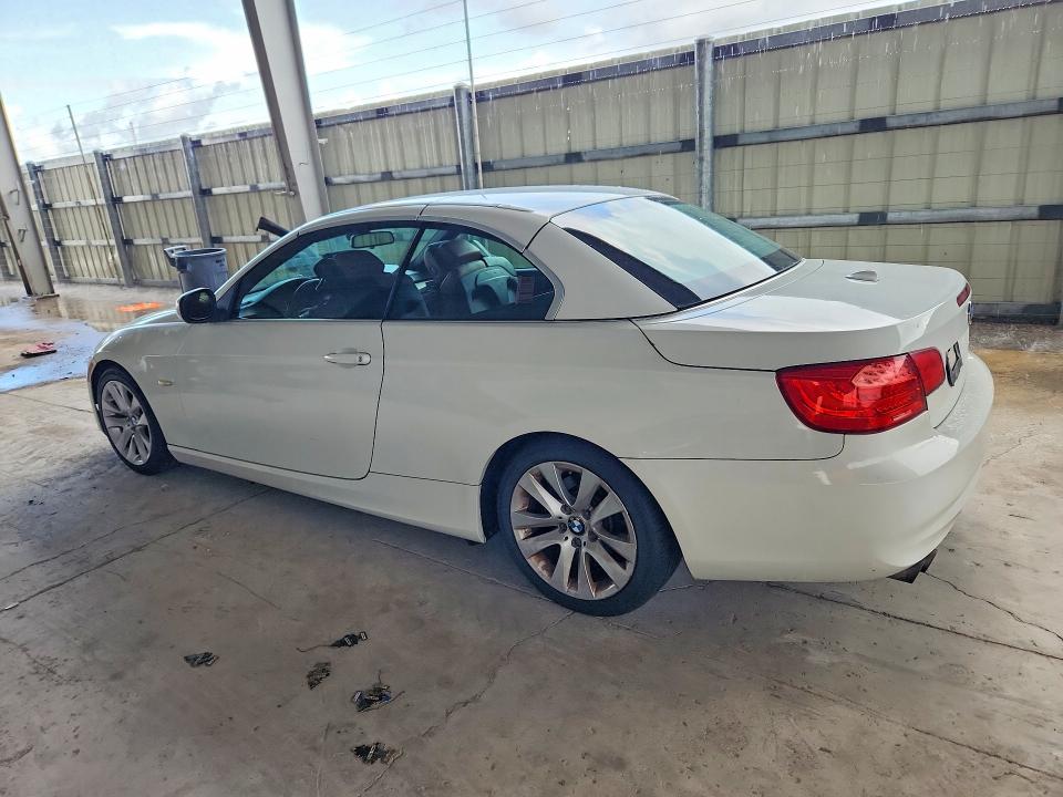 2012 BMW 3 series VIN WBADW7C5XCE730048 COPART salvage auction — MINOR DENT/SCRATCHES, FL - CERT OF TTL-REBUILT&SLVG RBLD, sold $825 on 2026-07-29 (photo 2)
