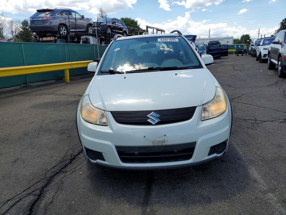 2009 Suzuki Sx4 VIN JS2YA413096201610 COPART salvage auction — HAIL, CO - DIS/DLR/EXP ONLY CLEAN TITLE, sold $825 on 2026-09-10 (photo 5)