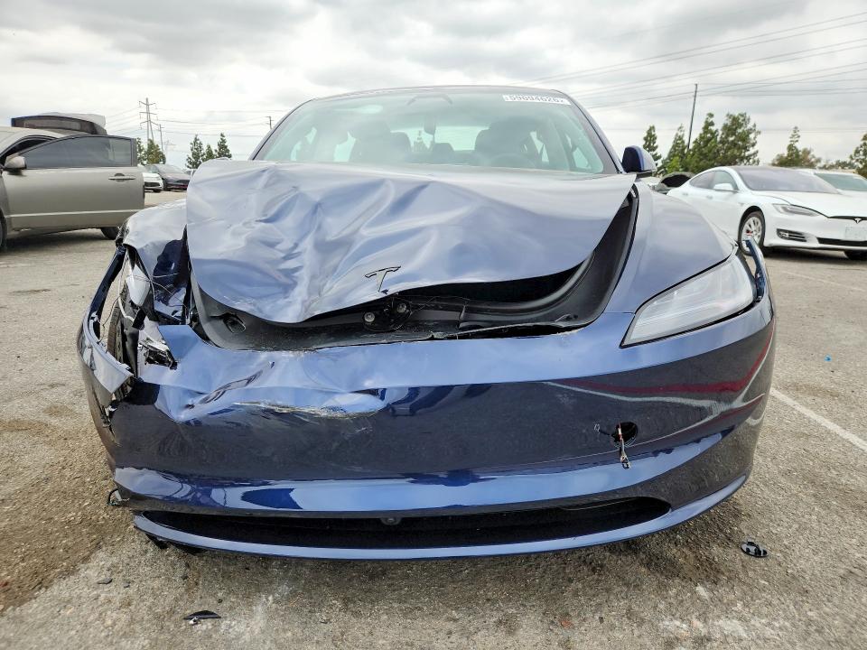 2026 Tesla Model 3 VIN 5YJ3E1EA2TF206707 COPART salvage auction — FRONT END, Ca - Salvage Certificate, sold $15,000 on 2026-10-08 (photo 5)