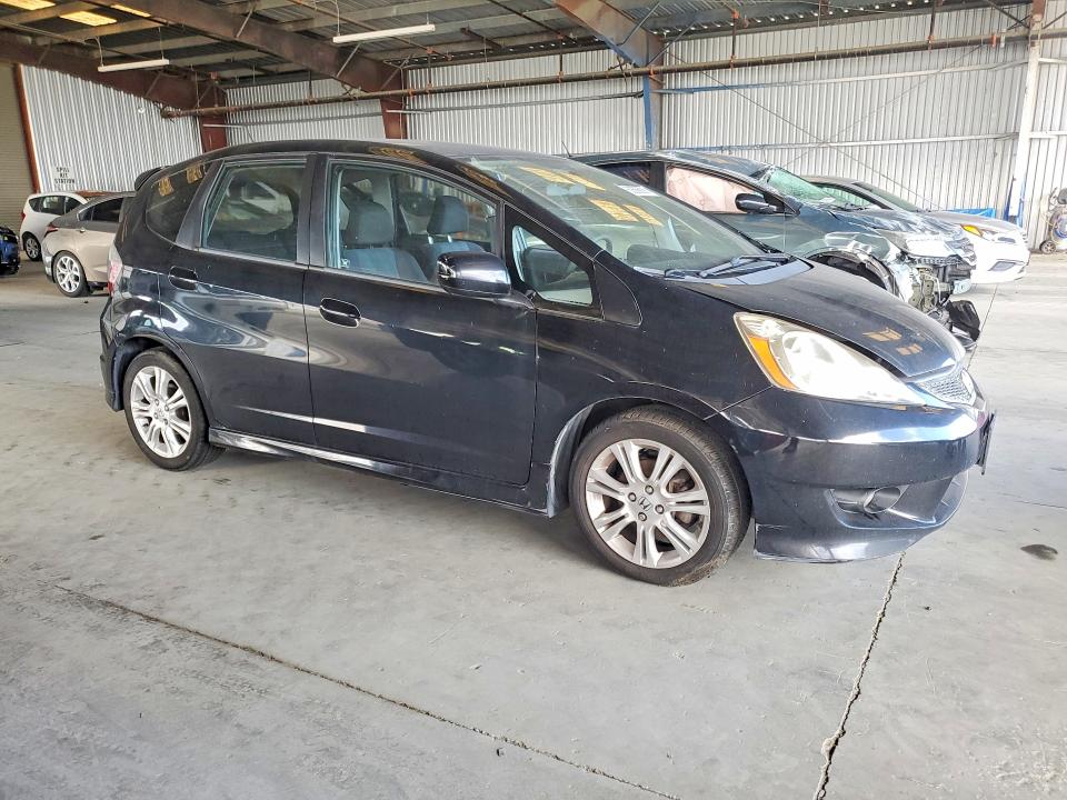 2009 Honda Fit VIN JHMGE88419S018741 COPART salvage auction — MINOR DENT/SCRATCHES, Ca - Dis/Dlr/Exp Only Clean Title, sold $825 on 2026-07-30 (photo 4)