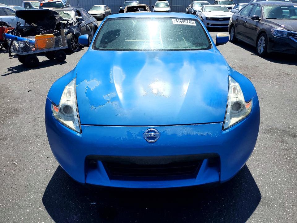 2011 Nissan 370z VIN JN1AZ4EHXBM551762 COPART salvage auction — VANDALISM, Fl - Dis/Dlr/Exp Only Salvage Title, sold $5,100 on 2026-07-28 (photo 5)
