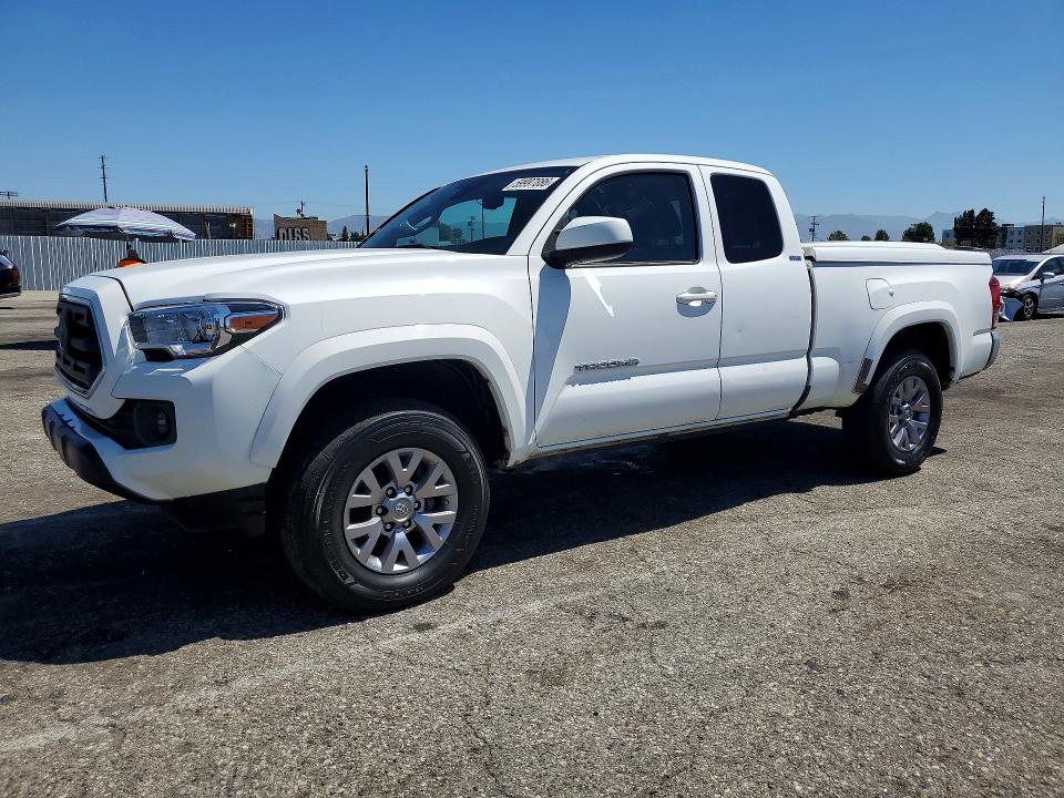 2018 Toyota Tacoma VIN 5TFSZ5AN8JX123088 COPART salvage auction — MINOR DENT/SCRATCHES, Fl - Dis/Dlr/Exp Only Clean Title (P), sold $10,200 on 2026-07-21 (photo 1)