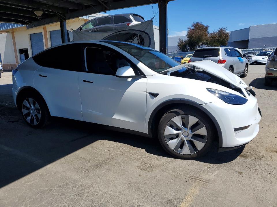 2023 Tesla Model y VIN 7SAYGDEE3PF742918 COPART salvage auction — FRONT END, Ca - Salvage Certificate, sold $15,100 on 2026-07-14 (photo 4)