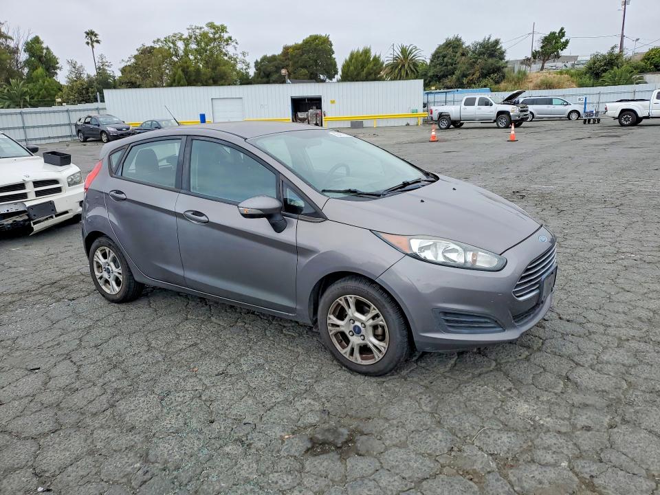 2014 Ford Fiesta VIN 3FADP4EJ8EM125313 COPART salvage auction — MINOR DENT/SCRATCHES, Ca - Dis/Dlr/Exp Only Clean Title, sold $425 on 2026-07-10 (photo 4)
