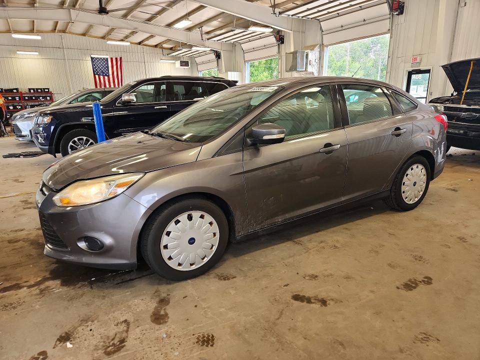 2014 Ford Focus VIN 1FADP3F22EL383300 COPART salvage auction — MINOR DENT/SCRATCHES, Mn - Non Public Clean Title, sold $650 on 2026-08-01 (photo 1)