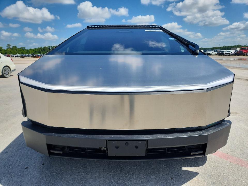 2024 Tesla Cybertruck VIN 7G2CEHEE9RA026641 COPART salvage auction — DAMAGE HISTORY, Tx - Cert Of Title-Rebuilt Salvage (P), sold $40,000 on 2026-07-17 (photo 5)