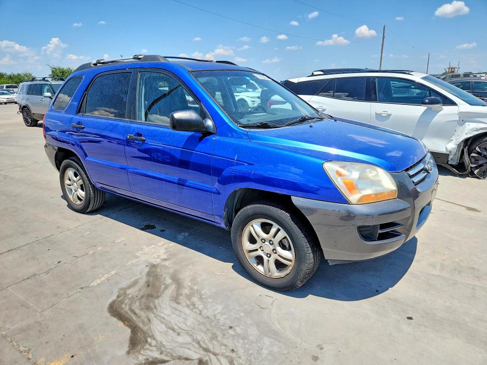 2007 Kia Sportage VIN KNDJF723577363110 COPART salvage auction — NORMAL WEAR, Tx - Certificate Of Title, sold $1,050 on 2026-07-09 (photo 4)
