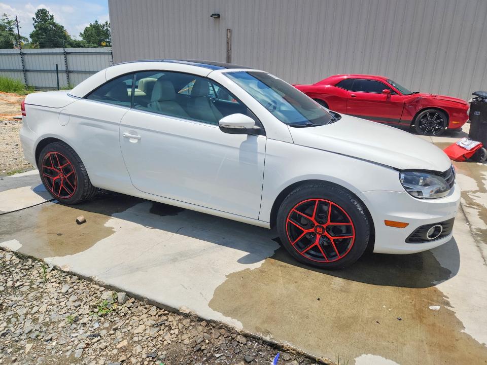 2013 Volkswagen Eos VIN WVWBW8AH7DV000287 COPART salvage auction — MINOR DENT/SCRATCHES, Ga - Certificate Of Title, sold $375 on 2026-07-19 (photo 4)