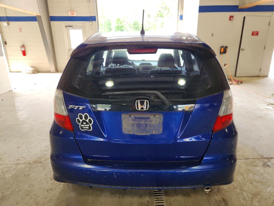 2009 Honda Fit VIN JHMGE886X9S002796 COPART salvage auction — REAR END, Va - Cert Of Title - Salvage, sold $225 on 2026-07-31 (photo 6)