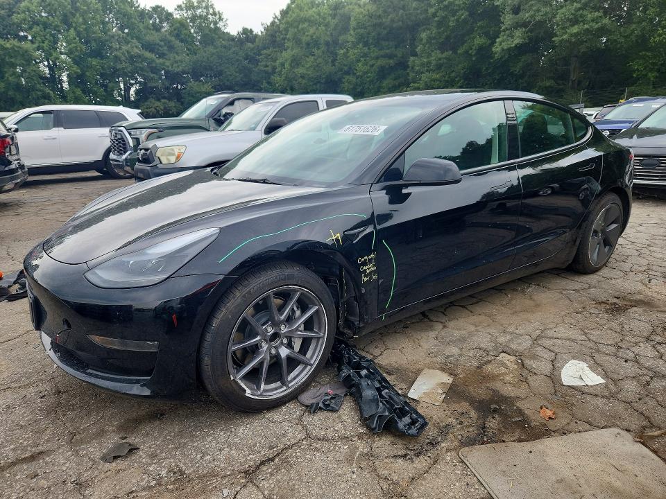 2023 Tesla Model 3 VIN 5YJ3E1EA9PF668011 — COPART salvage auction photo