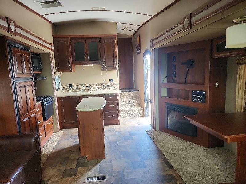 2014 Keystone Outback VIN 4YDF28626EB453415 COPART salvage auction — HAIL, MO - SALVAGE CERTIFICATE OF TITLE, sold $5,300 on 2026-09-09 (photo 6)