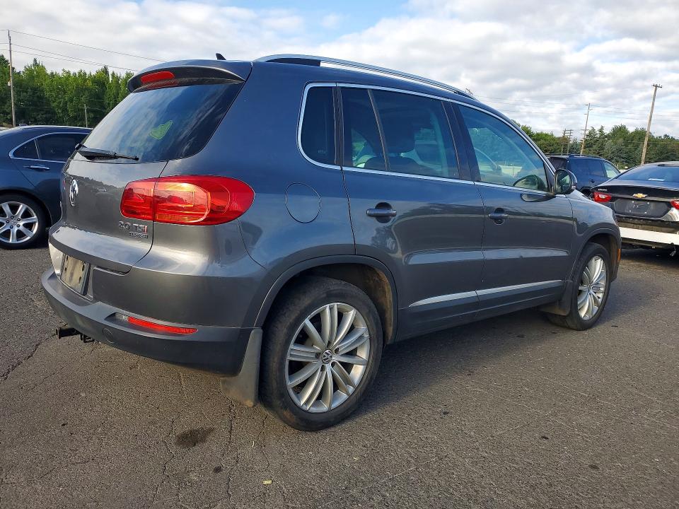 2013 Volkswagen Tiguan VIN WVGBV3AX6DW588847 COPART salvage auction — MINOR DENT/SCRATCHES, Or - Certificate Of Title, sold $1,700 on 2026-08-10 (photo 3)