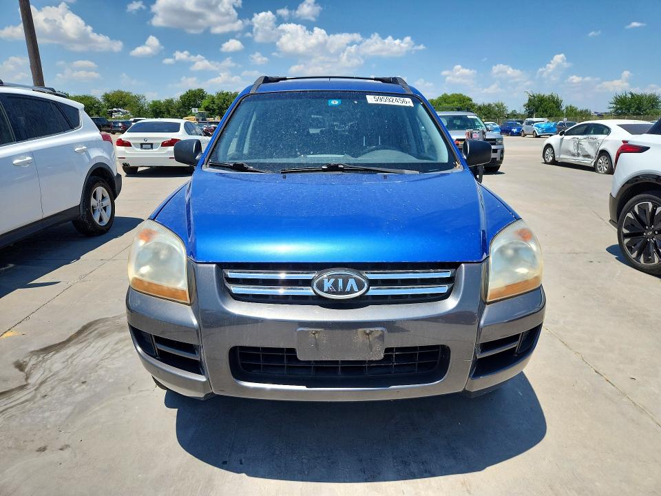 2007 Kia Sportage VIN KNDJF723577363110 COPART salvage auction — NORMAL WEAR, Tx - Certificate Of Title, sold $1,050 on 2026-07-09 (photo 5)