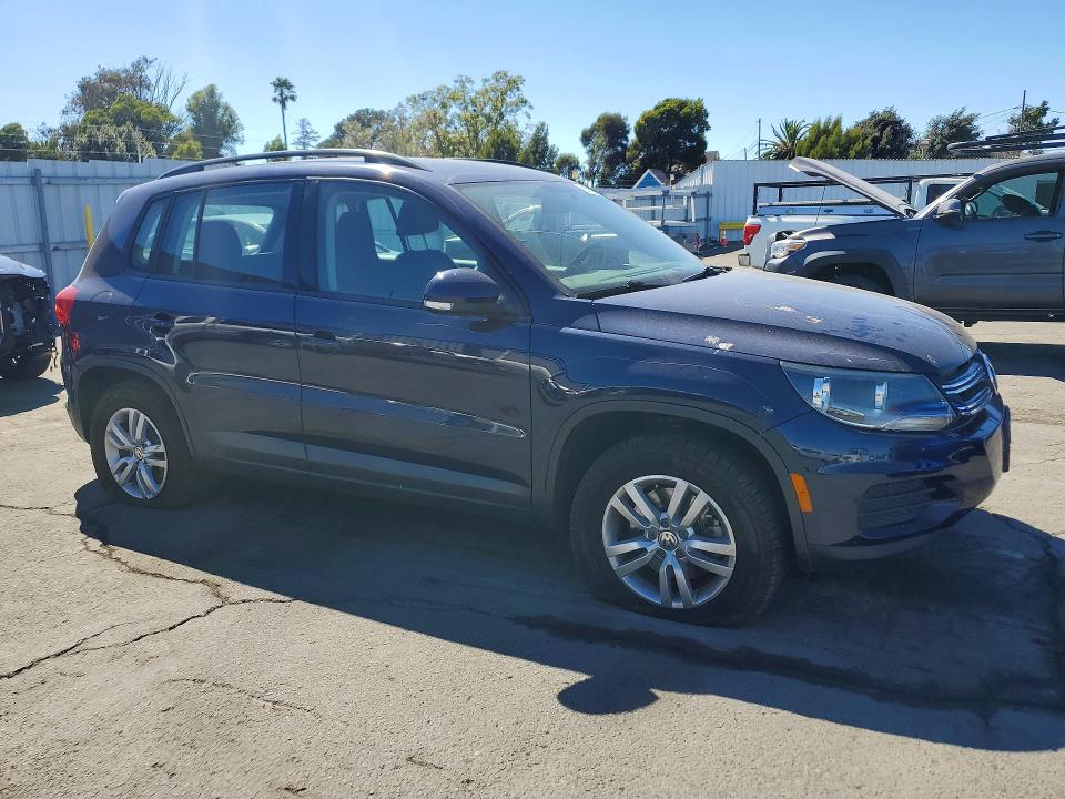 2015 Volkswagen Tiguan VIN WVGBV7AX1FW552834 COPART salvage auction — VANDALISM, Ca - Salvage Certificate, sold $750 on 2026-08-07 (photo 4)