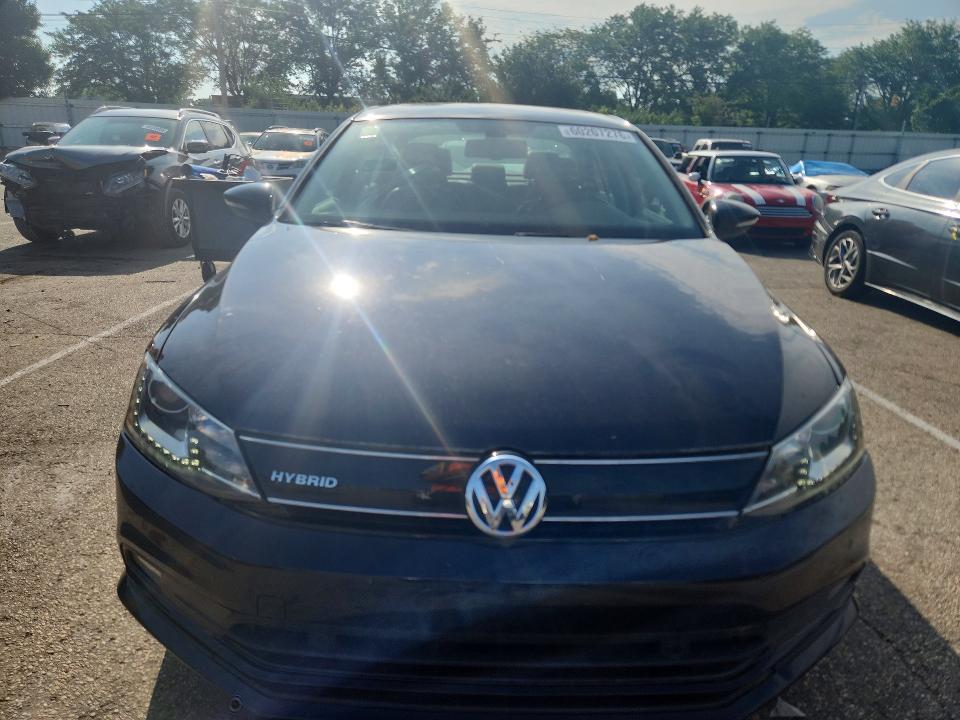 2016 Volkswagen Jetta VIN 3VW637AJ0GM380415 COPART salvage auction — NORMAL WEAR, OH - CERTIFICATE OF TITLE, sold $2,000 on 2026-08-02 (photo 5)