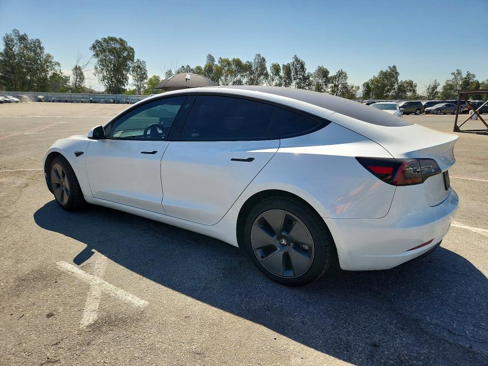 2023 Tesla Model 3 VIN 5YJ3E1EA4PF606046 COPART salvage auction — SIDE, Ca - Salvage Certificate, sold $250 on 2026-07-21 (photo 2)