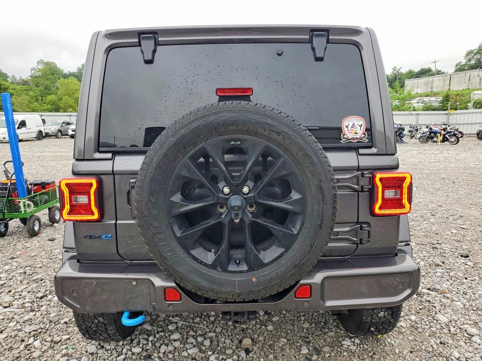 2021 Jeep Wrangler unlimited VIN 1C4JJXP64MW762142 COPART salvage auction — MINOR DENT/SCRATCHES, Oh - Cert Of Title-Rebuilt Salvage, sold $16,200 on 2026-07-17 (photo 6)