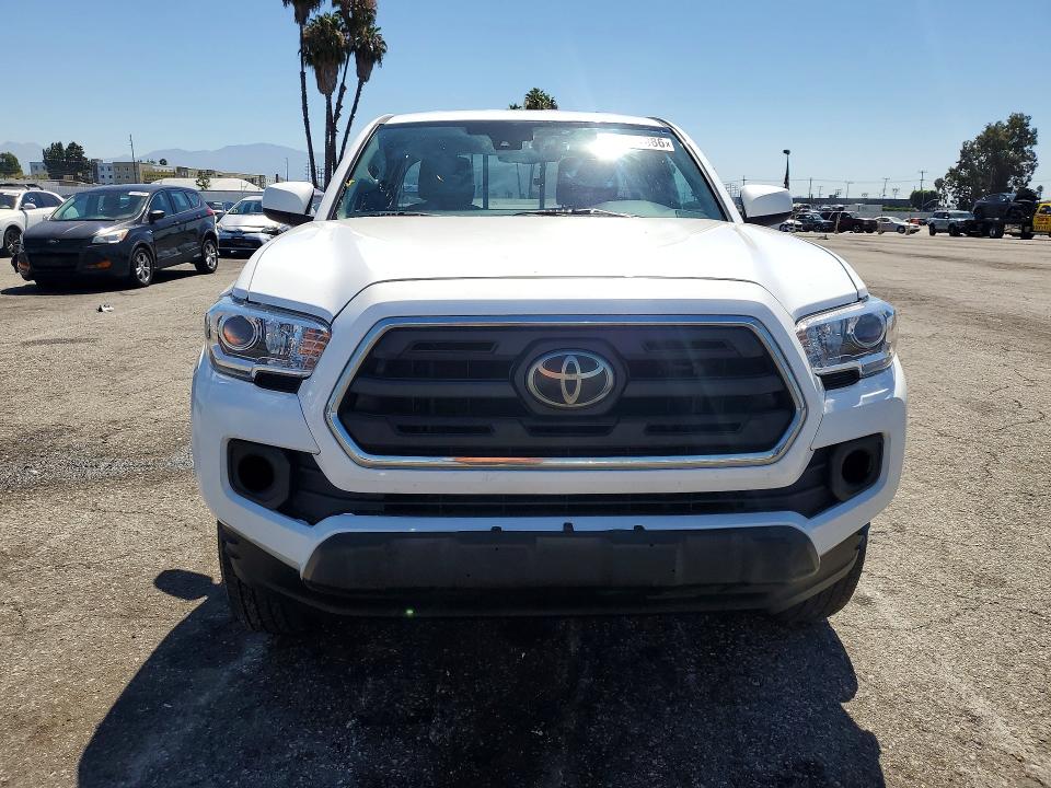 2018 Toyota Tacoma VIN 5TFSZ5AN8JX123088 COPART salvage auction — MINOR DENT/SCRATCHES, Fl - Dis/Dlr/Exp Only Clean Title (P), sold $10,200 on 2026-07-21 (photo 5)