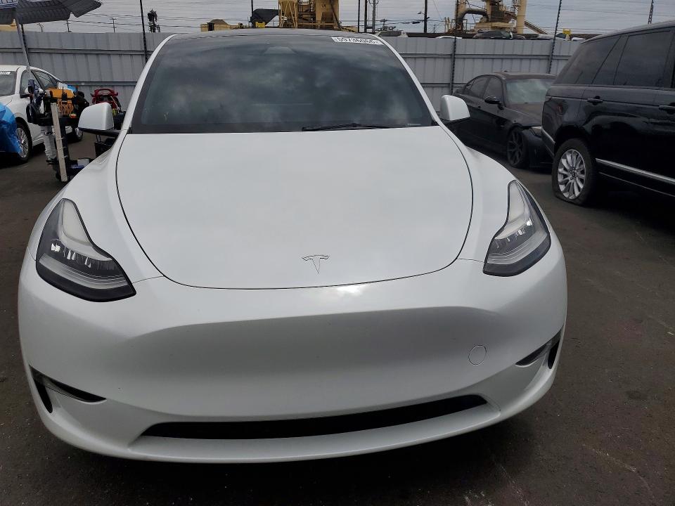 2023 Tesla Model y VIN 7SAYGDEE0PA154245 COPART salvage auction — REAR END, Ca - Salvage Certificate, sold $9,100 on 2026-07-15 (photo 5)