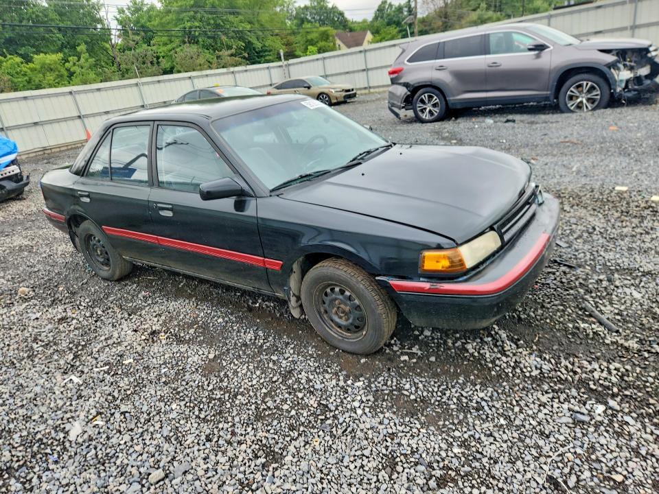 1990 Mazda Protege VIN JM1BG2246L0169203 COPART salvage auction — FRONT END, NJ - CERT OF TITLE-SALVAGE, sold $400 on 2026-07-31 (photo 4)