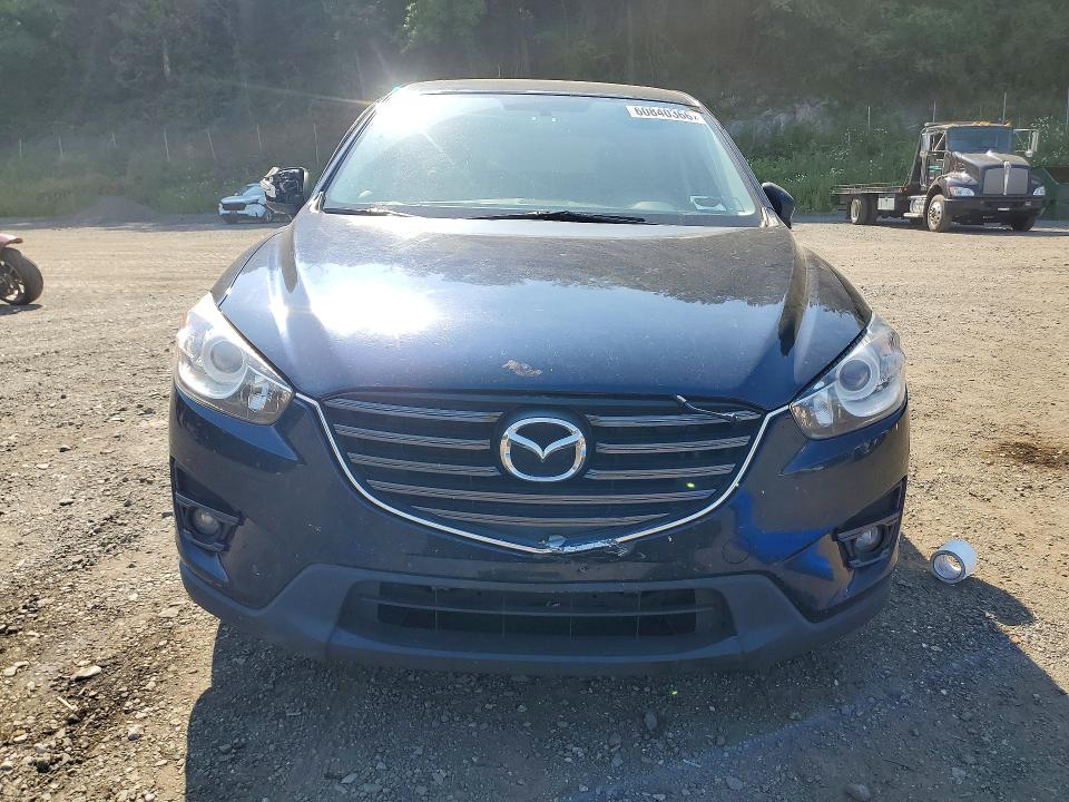 2016 Mazda Cx-5 VIN JM3KE4CY9G0846843 COPART salvage auction — SIDE, Ny - Mv-907A Salvage Certificate, sold $725 on 2026-07-21 (photo 5)