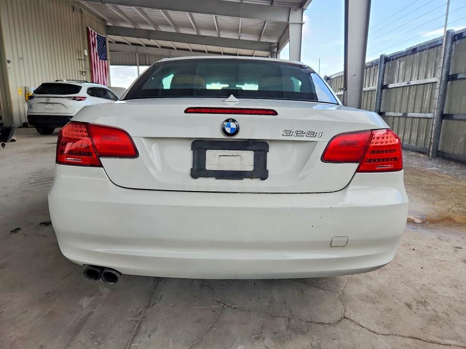 2012 BMW 3 series VIN WBADW7C5XCE730048 COPART salvage auction — MINOR DENT/SCRATCHES, FL - CERT OF TTL-REBUILT&SLVG RBLD, sold $825 on 2026-07-29 (photo 6)