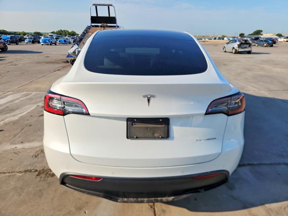 2022 Tesla Model y VIN 7SAYGDEE2NF419618 COPART salvage auction — WATER/FLOOD, Tx - Cert Of Title-Reblt Slvg Flood (P), sold $6,900 on 2026-07-16 (photo 6)