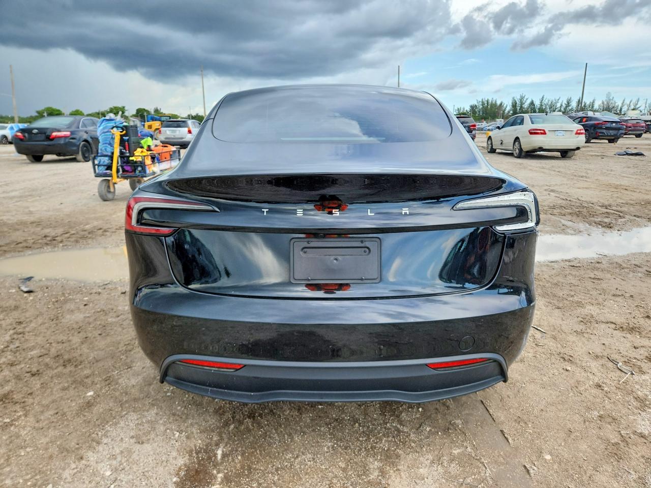 2025 Tesla Model 3 VIN 5YJ3E1EA2SF985055 COPART salvage auction — Front End, Rb - Salvage Title, sold $12,000 on 2026-09-17 (photo 6)