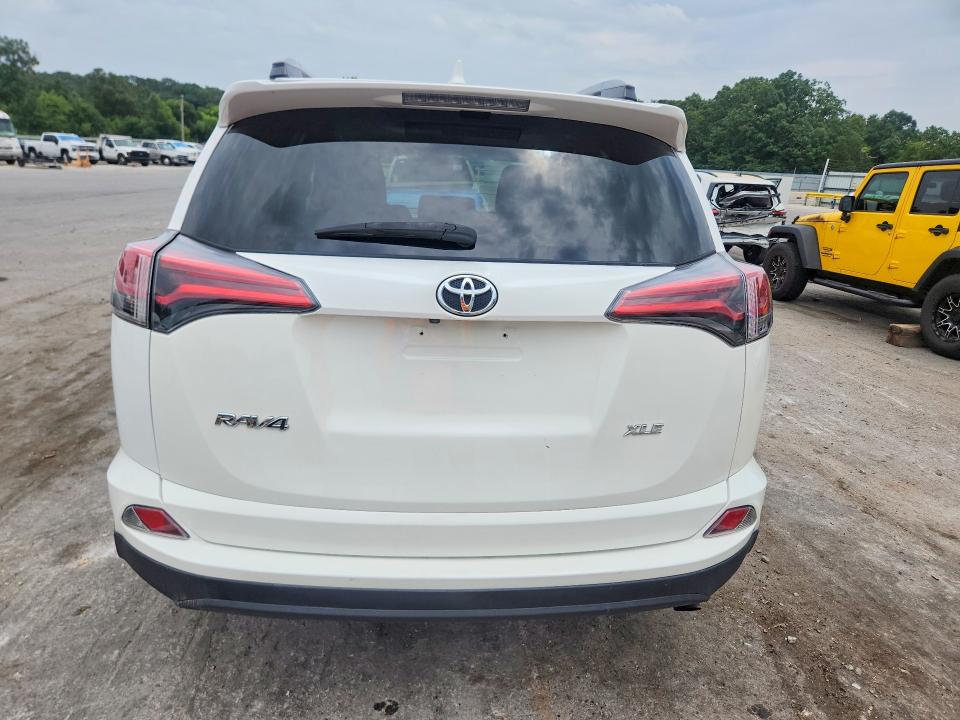 2018 Toyota Rav4 VIN 2T3WFREV9JW498469 COPART salvage auction — MINOR DENT/SCRATCHES, Mo - Cert Of Title-Prior Salvage, sold $7,300 on 2026-08-19 (photo 6)