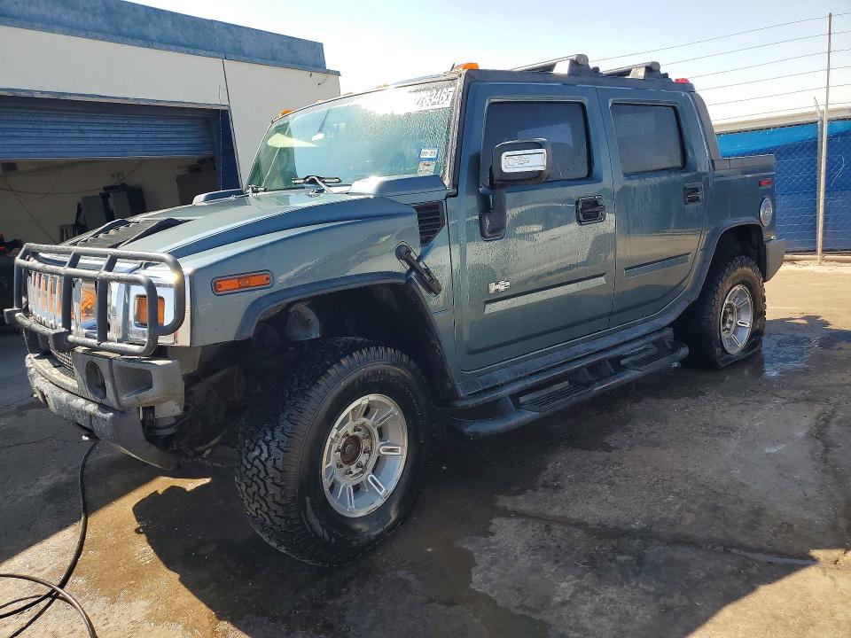 2006 Hummer H2 VIN 5GRGN22UX6H113510 COPART salvage auction — MINOR DENT/SCRATCHES, TX - CERTIFICATE OF TITLE, sold $1,350 on 2026-07-23 (photo 1)