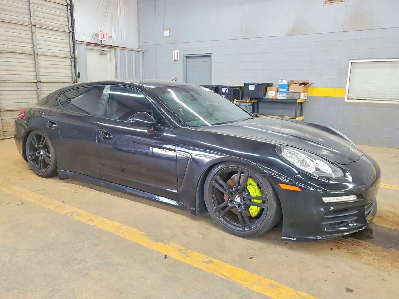 2016 Porsche Panamera VIN WP0AD2A77GL040584 COPART salvage auction — Frame Damage, NC - DLR ONLY-CLEAN/OVER 25% DAMAGE, sold $9,900 on 2026-09-02 (photo 4)