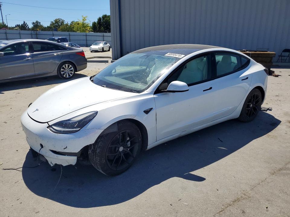 2021 Tesla Model 3 VIN 5YJ3E1EA9MF995147 — COPART salvage auction photo